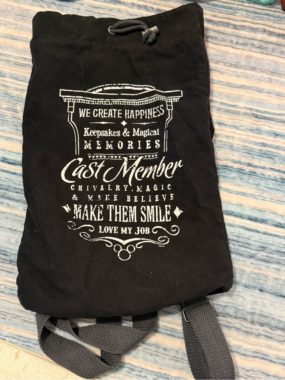Disney Black Drawstring Backpack with White Cast Member Typography